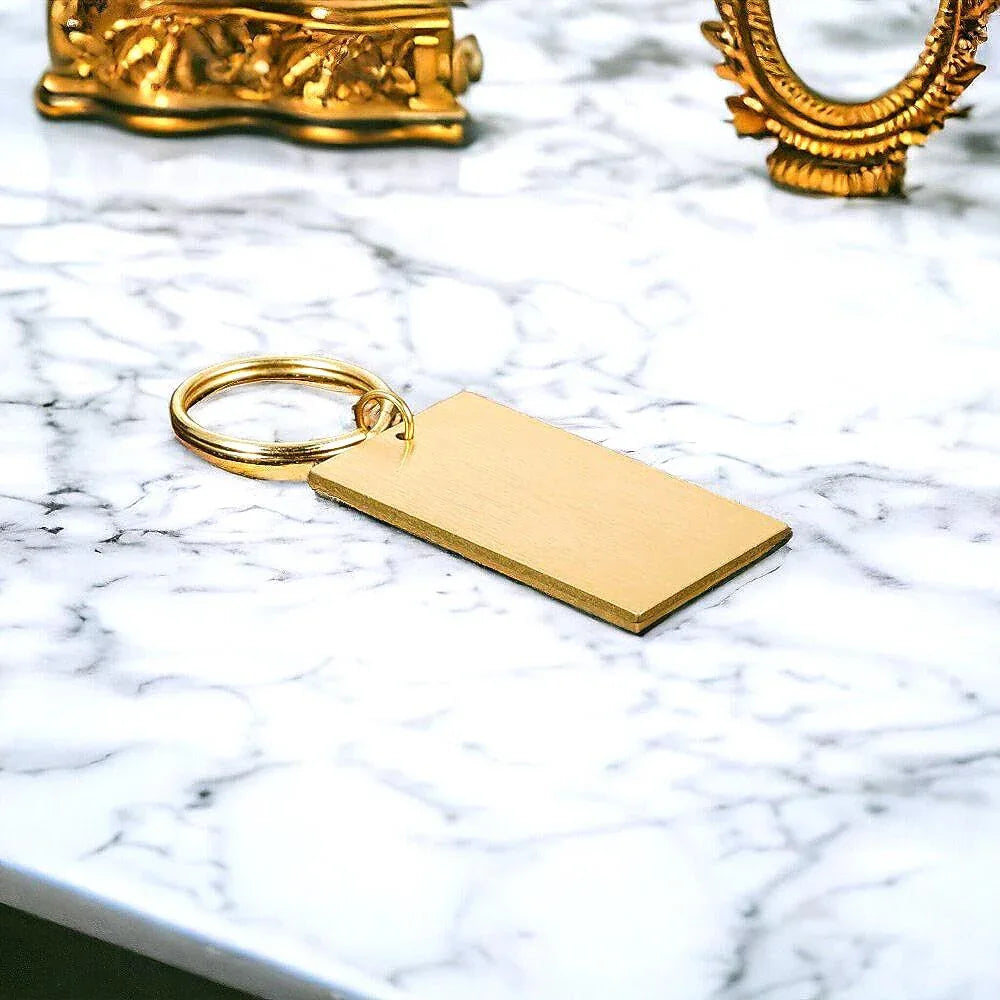 Porte-clés personnalisé Hyul Shelby – mural acier or gravé chic homme - Roaring 20s Paris